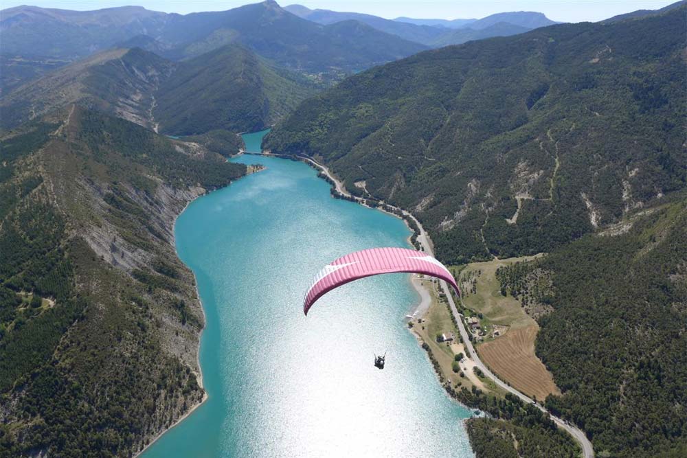 Tandem Paragliding Flight over the Lac de Castillon with Aérogliss Parapente