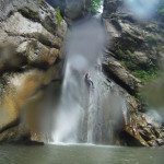 Abseiling down a waterfall in Angon Canyon near Annecy