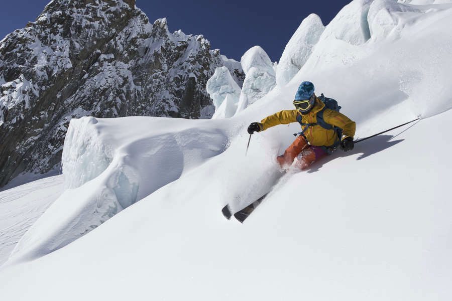 Skiing a steep powder section on the Petit Envers du Plan