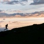 Rémi Berchet runs along a high mountain ridge in the French Alps