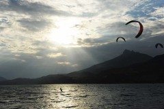 Late afternoon kitesurfing session on the Lac de Serre Poncon