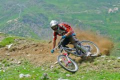 Kicking up some dust at the Cauterets Bike Park