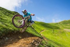 Airborne on the fast flowy blue trail in Cauterets