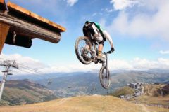 Mountain biker gets airborne in Saint Lary in the Pyrenees
