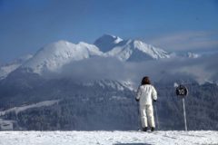 Skier takes on the Gazelle black run in Les Gets