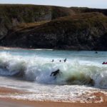Surfing at Donnant in Belle Ile, Brittany