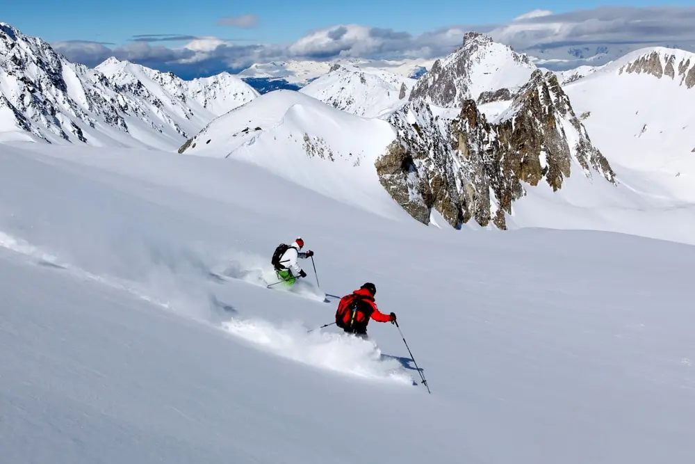 Off-Piste Skiing in the Three Valleys Two skiers enjoying off-piste skiing in the Three Valleys
