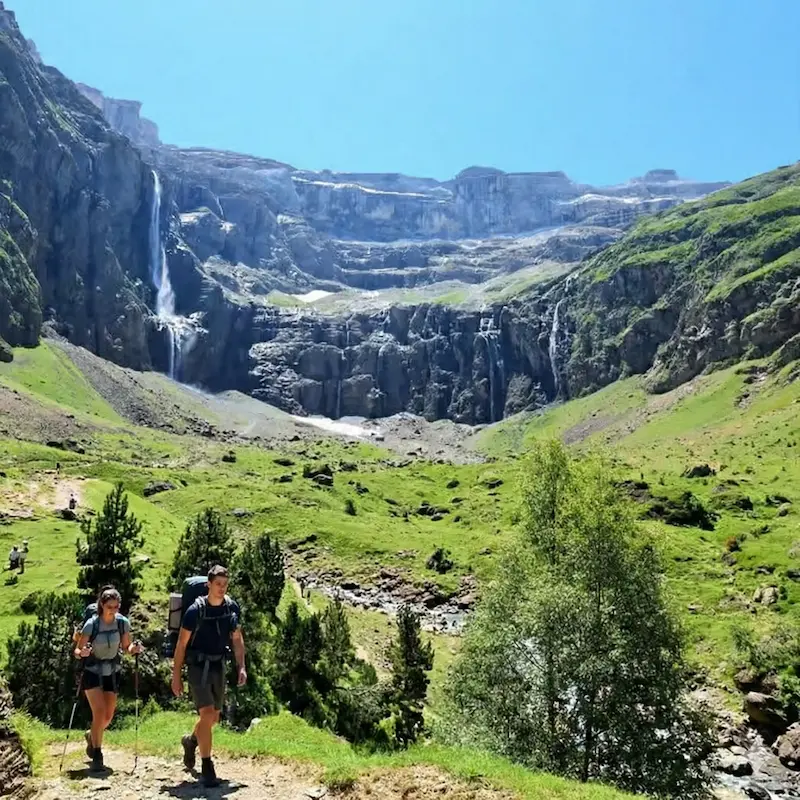 A couple hiking at the Cirque de Gavarnie in the French Pryrenees