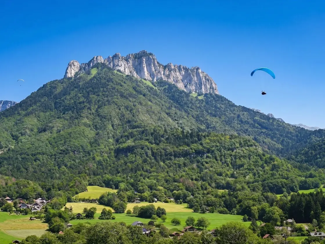 Paragliding over the Dents de Lanfon near Annecy in the French Alps