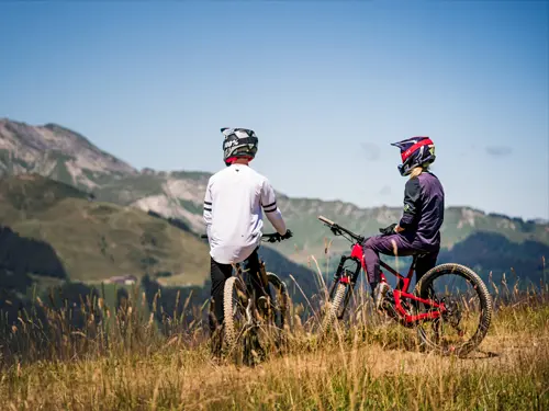 Mountain bikers enjoy the view in Morzine in the Portes du Soleil