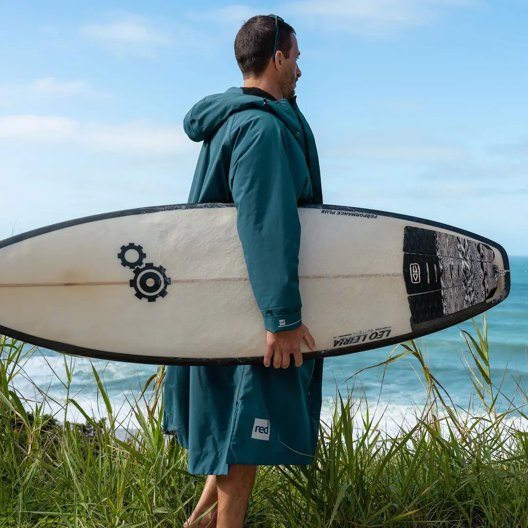Surfer wearing a Red Alter Evo Pro Changing Robe
