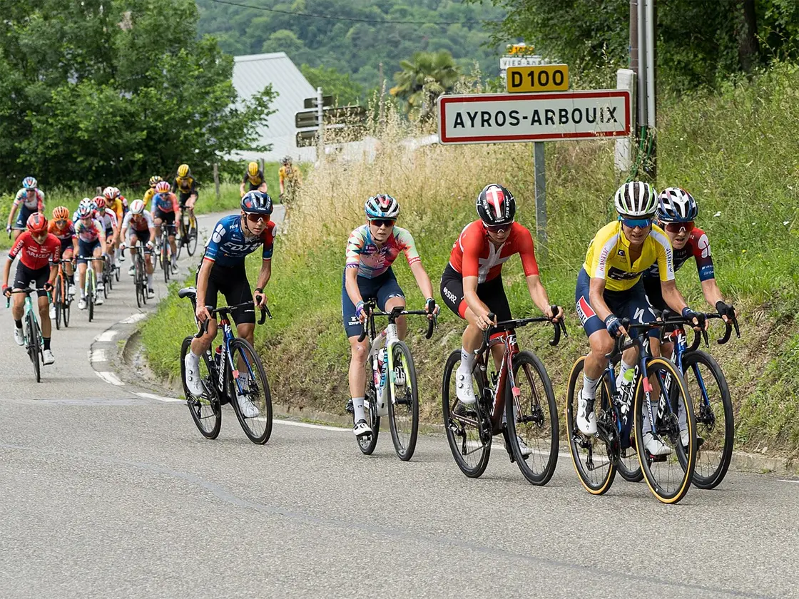 Road cyclists climbing the Hautacam above the Lavedan valley