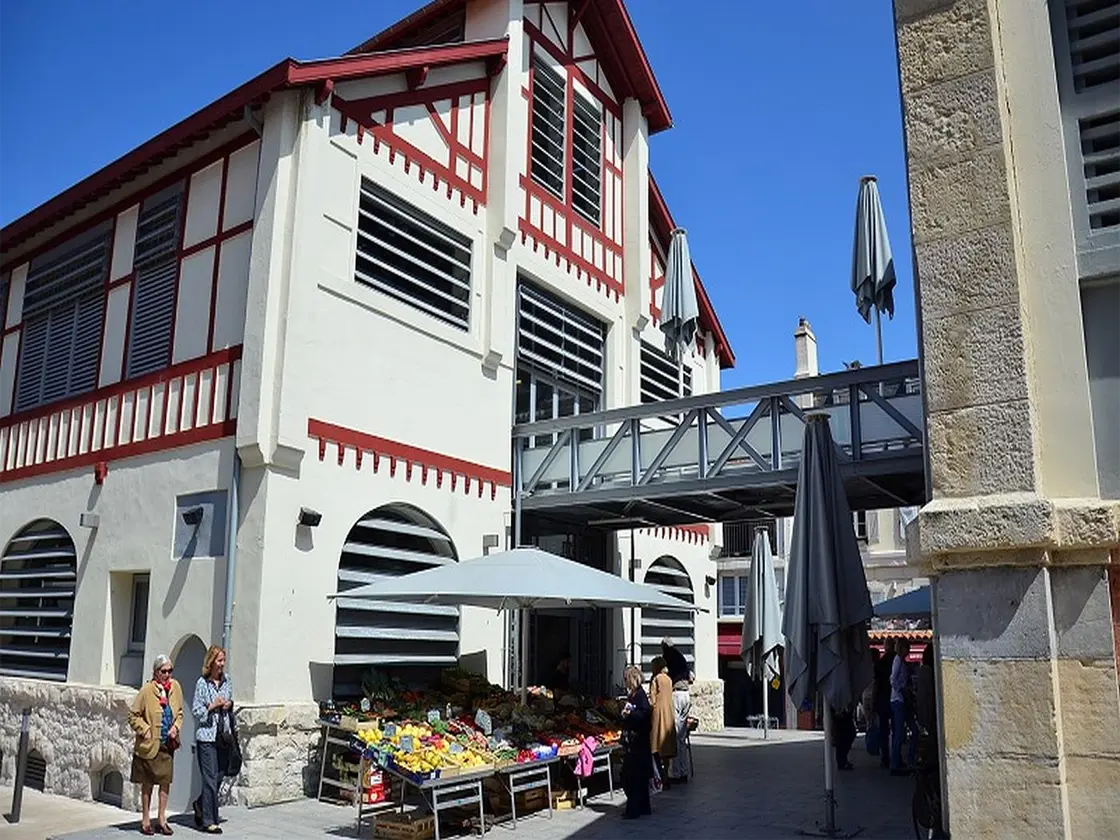 Pintxos and Basque produce on a market stall at Les Halles in Biarritz